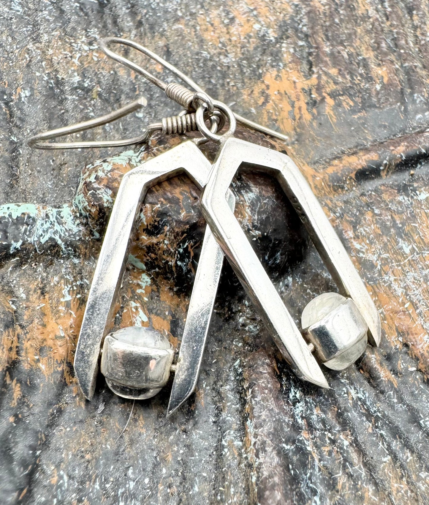 Geometric moonstone drop earrings with spinning elements