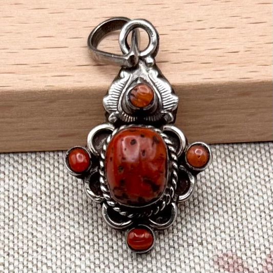 Vintage silver and coral pendant – ornate artisan design