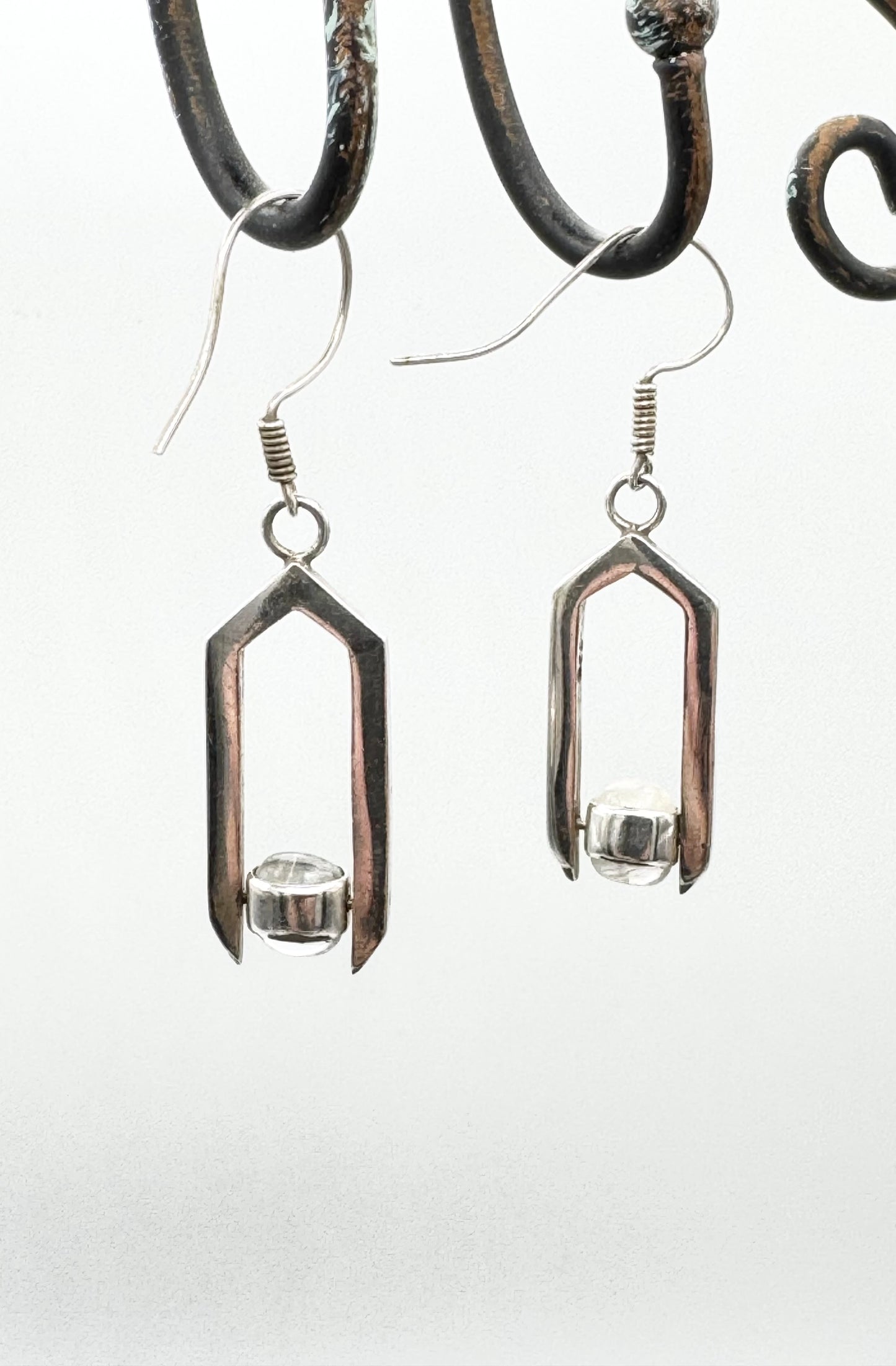 Geometric moonstone drop earrings with spinning elements
