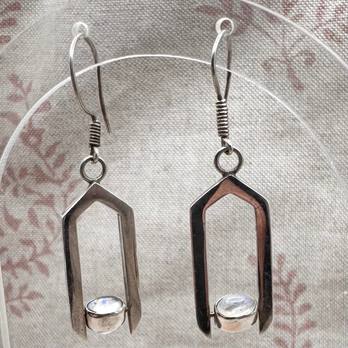 Geometric moonstone drop earrings with spinning elements