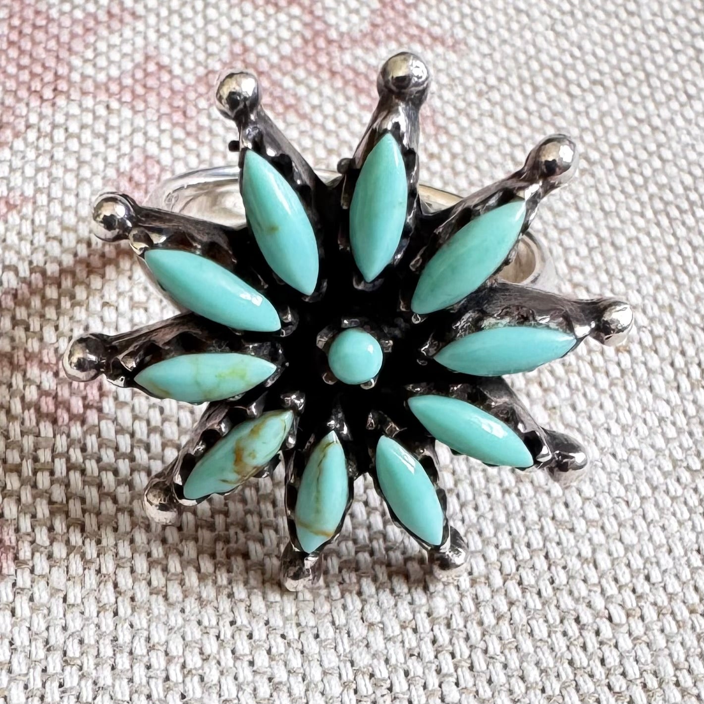 Turquoise ring in starburst floral design, size P/7.5