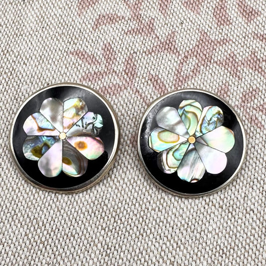 Statement clip-on earrings with abalone shell flower design