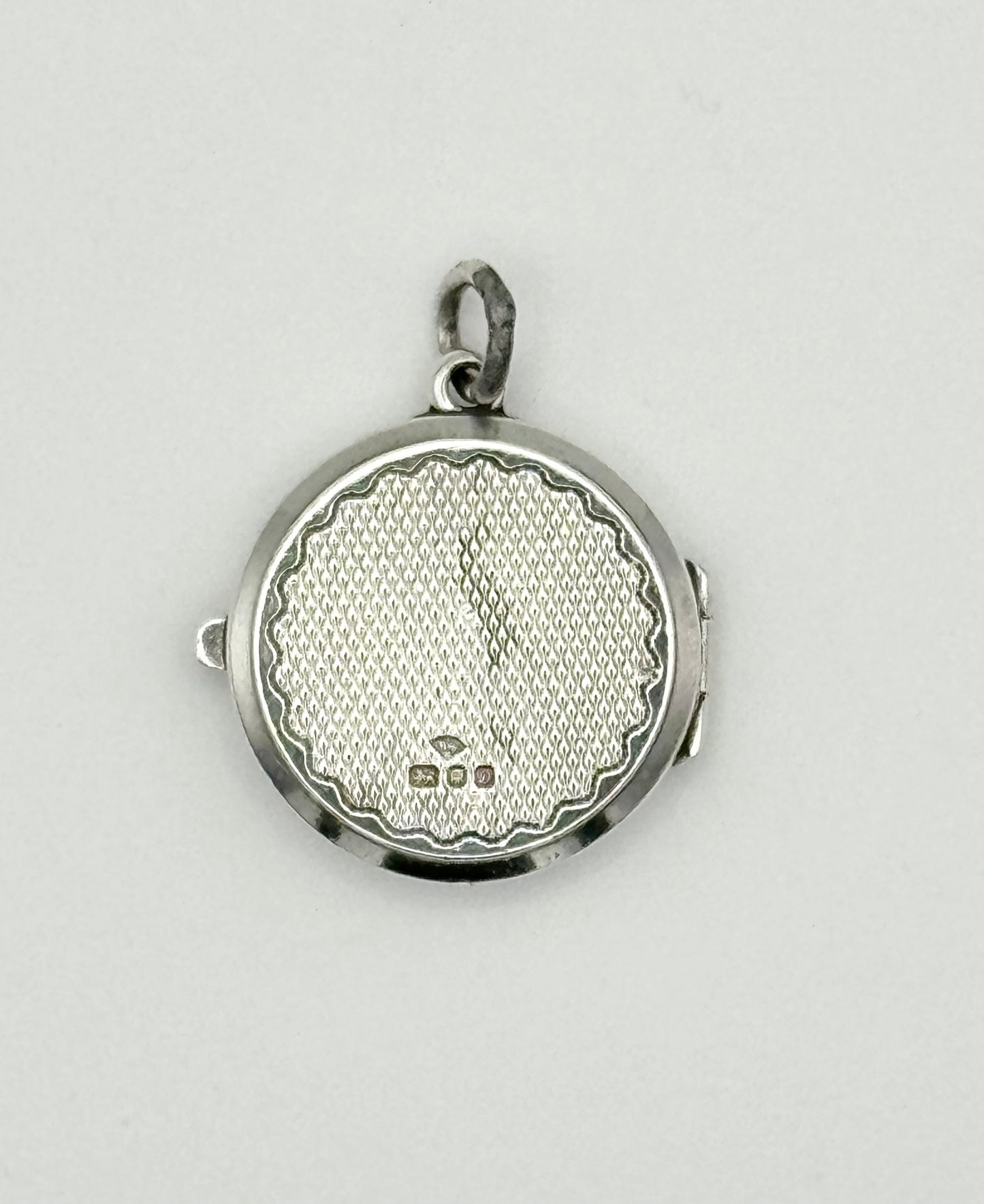 Silver locket, London 1978