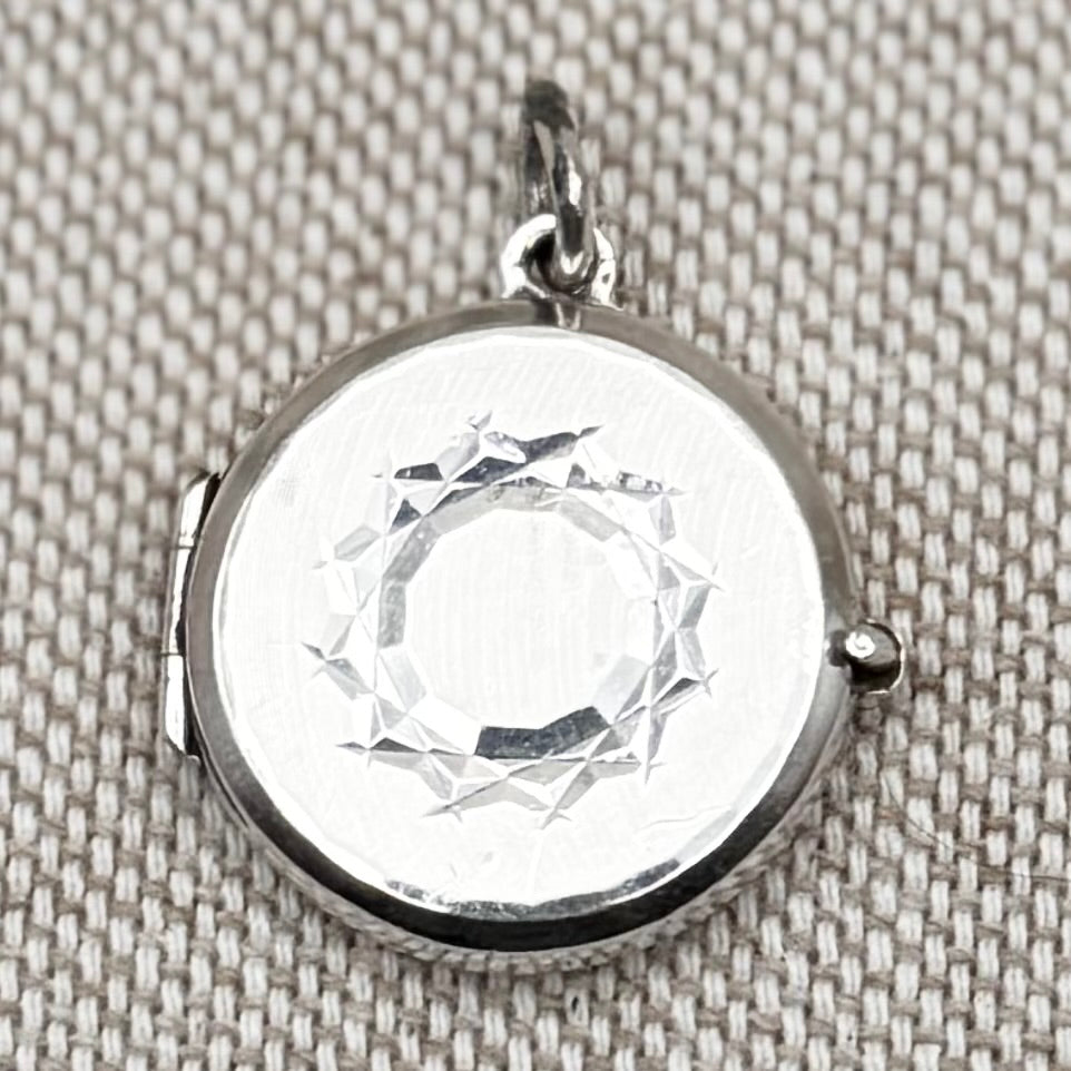 Silver locket, London 1978