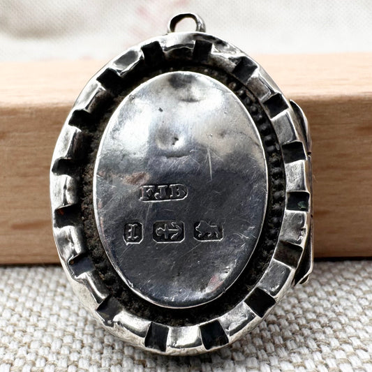 Victorian silver locket with engraved fern design, hallmarked Birmingham 1885