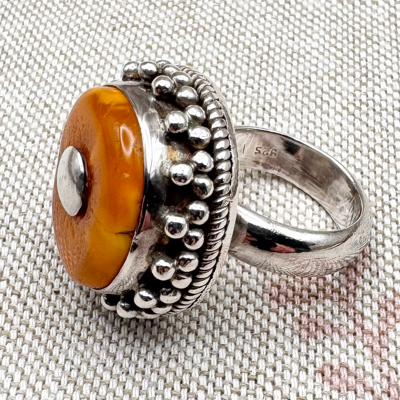 Vintage silver ring with circular amber and granule detail, size L/5.5