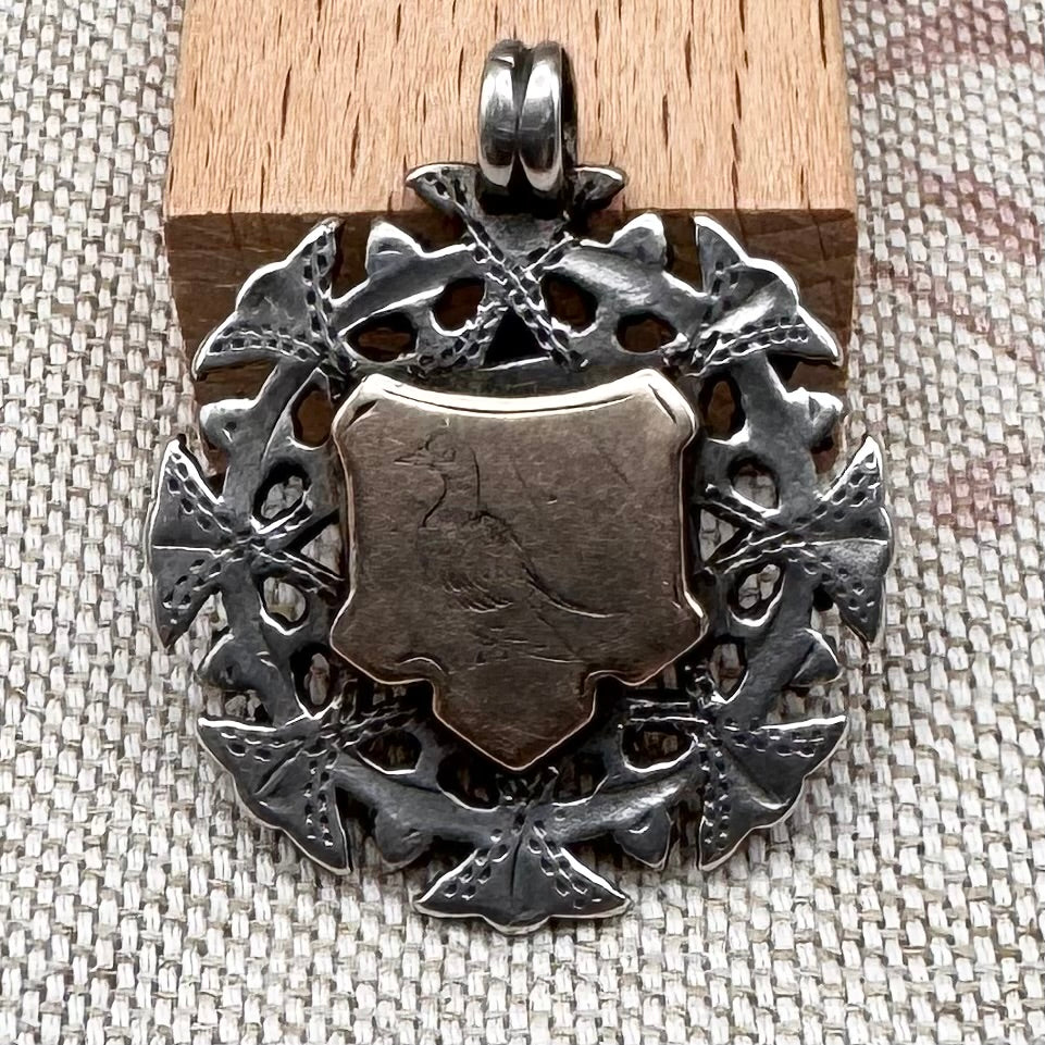 Antique silver & gilded pigeon fob medal, hallmarked for Birmingham, c.1894