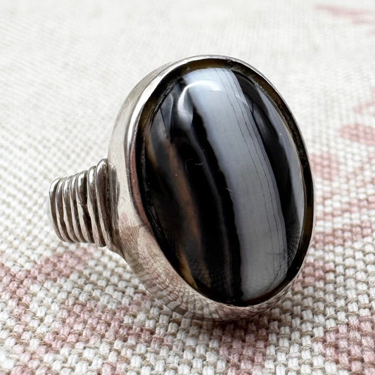 Black Botswana agate silver ring with coiled shoulders, size G.5 (US 3.5)