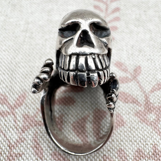 Skeleton ring with internal spine detail, size R (US 8.5) adjustable, hallmarked Birmingham
