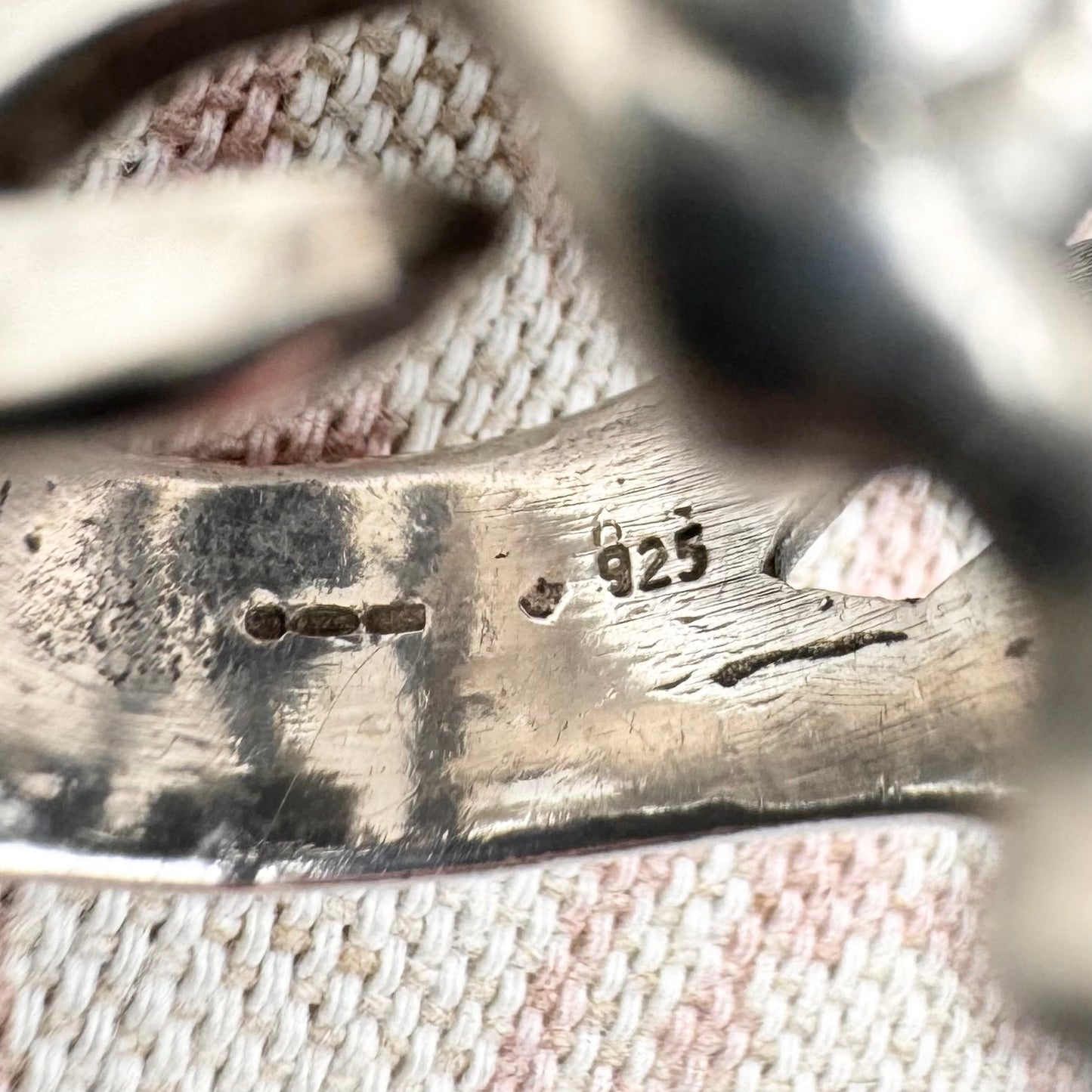 Skeleton ring with internal spine detail, size R (US 8.5) adjustable, hallmarked Birmingham