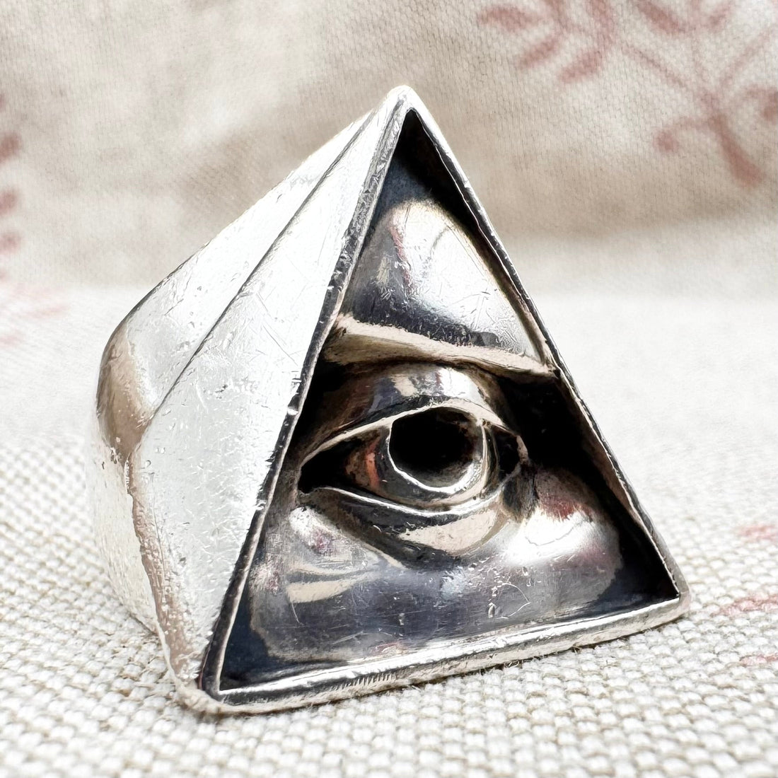 All seeing eye ring on textured background