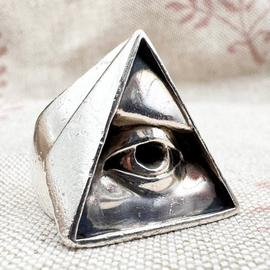 All seeing eye ring on textured background