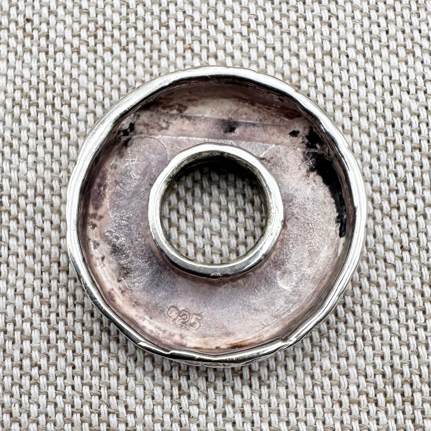 Textured silver pebble pendant