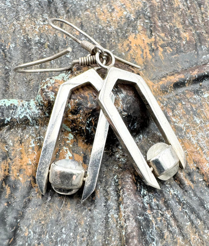 Geometric moonstone drop earrings with spinning elements