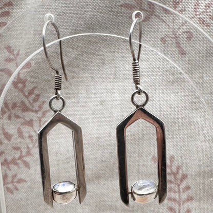 Geometric moonstone drop earrings with spinning elements