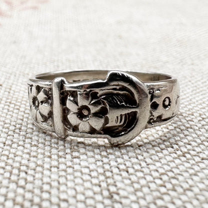 Silver buckle ring with floral detail, hallmarked Birmingham 1977, size M (US 6.25)