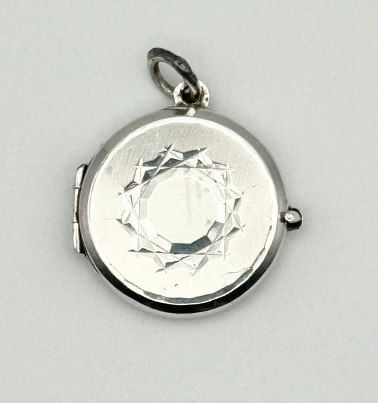 Silver locket, London 1978