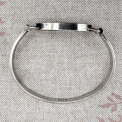 Silver banded agate bangle, hallmarked Sheffield 1978