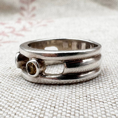 Silver multi-stone ring with open band design, size O.5 (US 7.5)