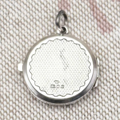 Silver locket, London 1978