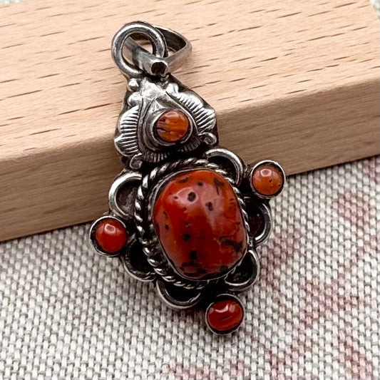 Vintage silver and coral pendant – ornate artisan design