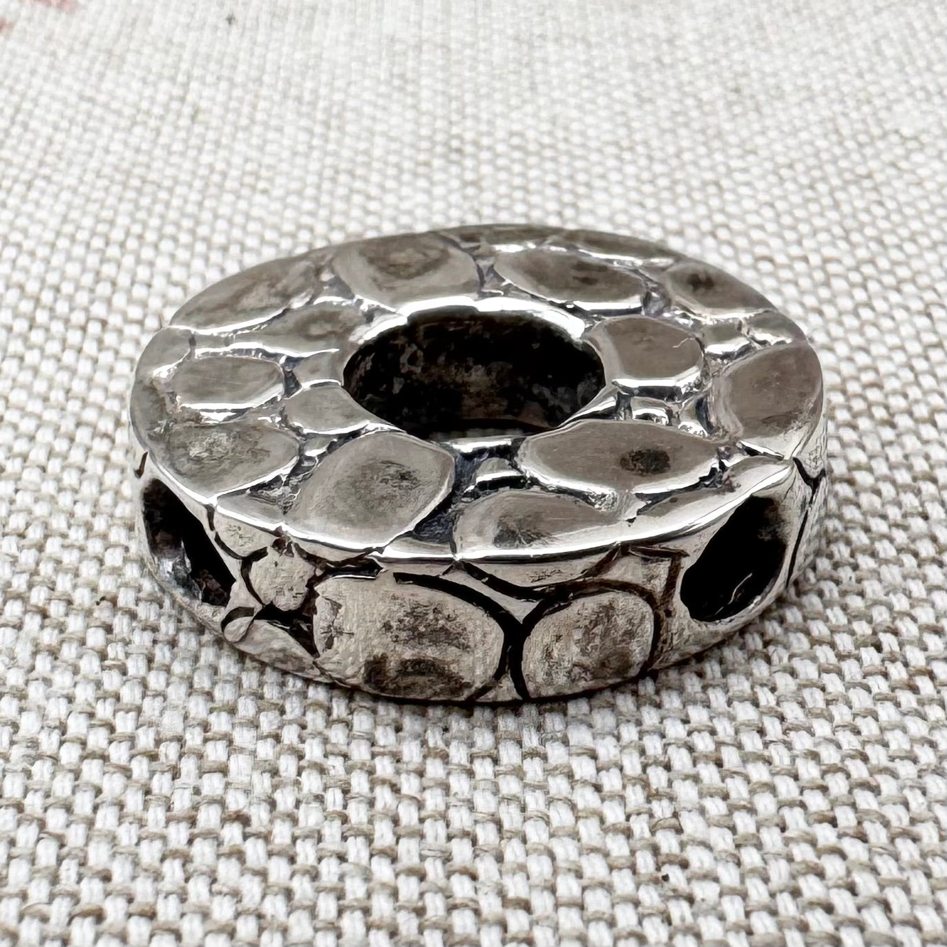 Textured silver pebble pendant