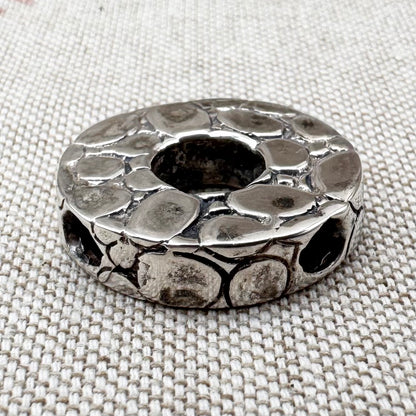 Textured silver pebble pendant