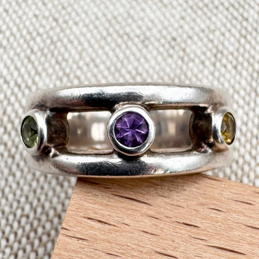 Silver multi-stone ring with open band design, size O.5 (US 7.5)