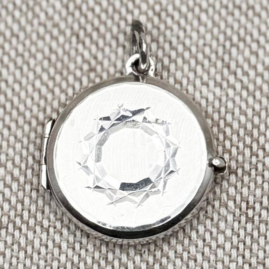 Silver locket, London 1978