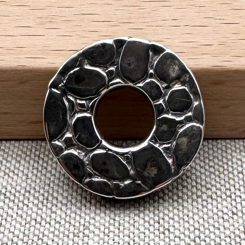 Textured silver pebble pendant