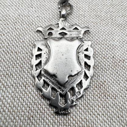 Edwardian silver medallion keyring with historic coin charms, hallmarked Birmingham 1906