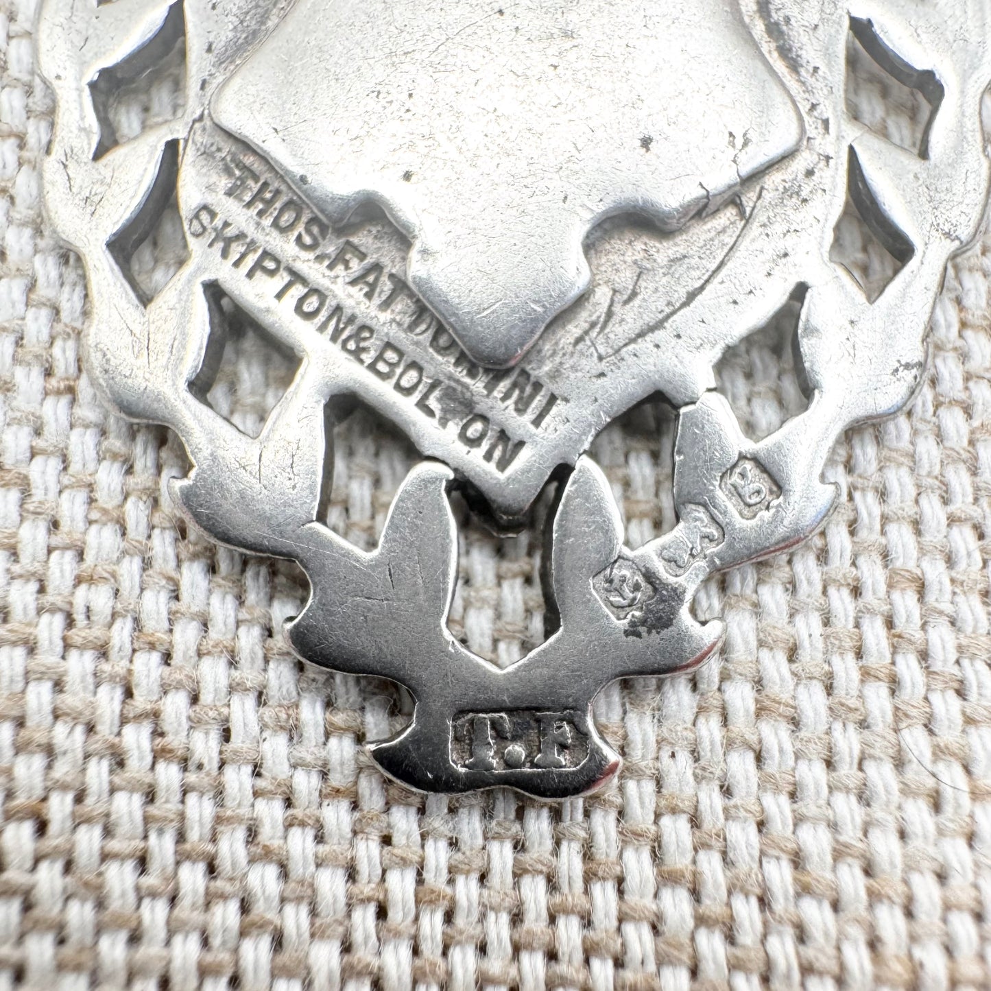 Edwardian silver medallion keyring with historic coin charms, hallmarked Birmingham 1906