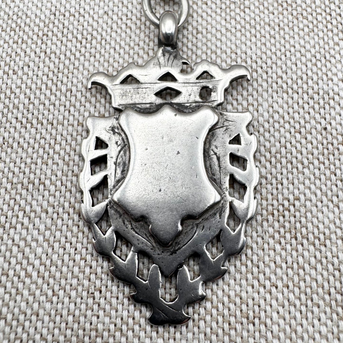 Edwardian silver medallion keyring with historic coin charms, hallmarked Birmingham 1906