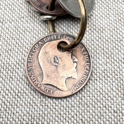 Edwardian silver medallion keyring with historic coin charms, hallmarked Birmingham 1906