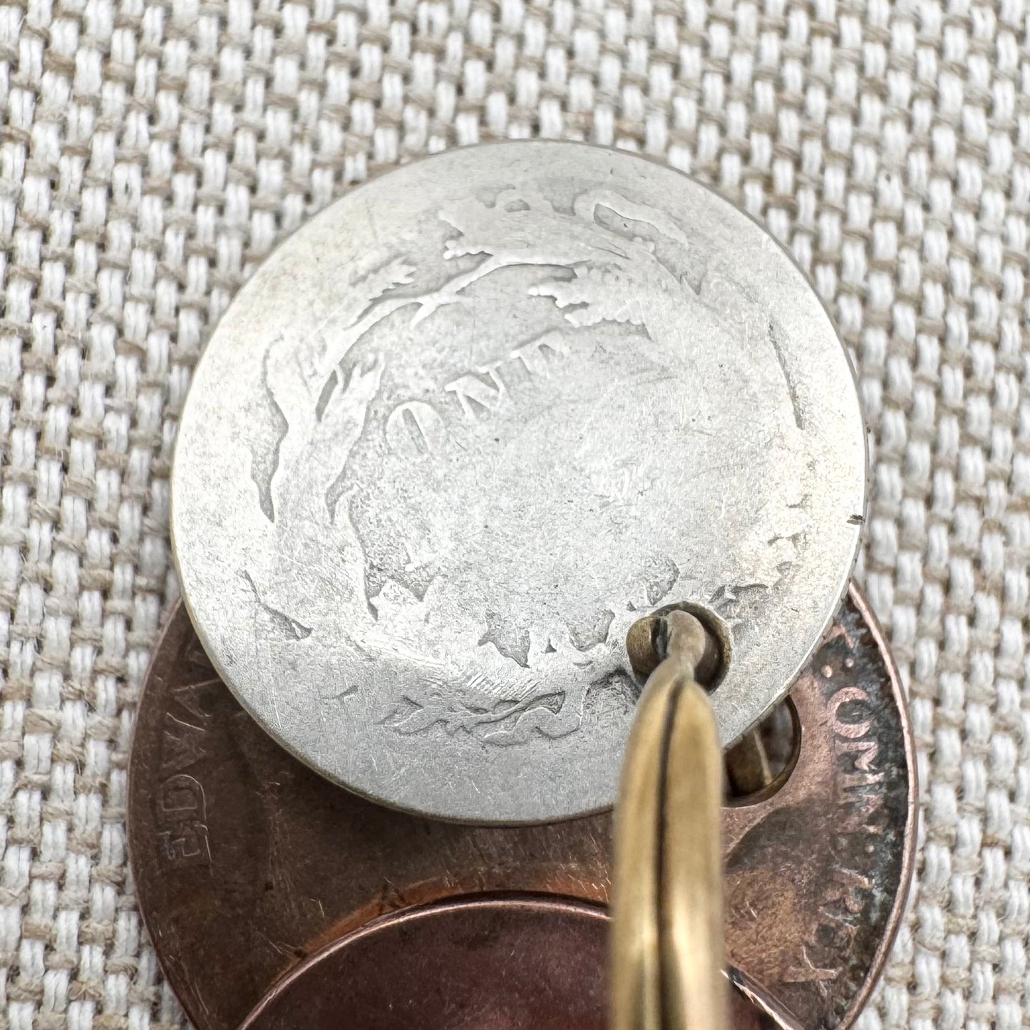 Edwardian silver medallion keyring with historic coin charms, hallmarked Birmingham 1906