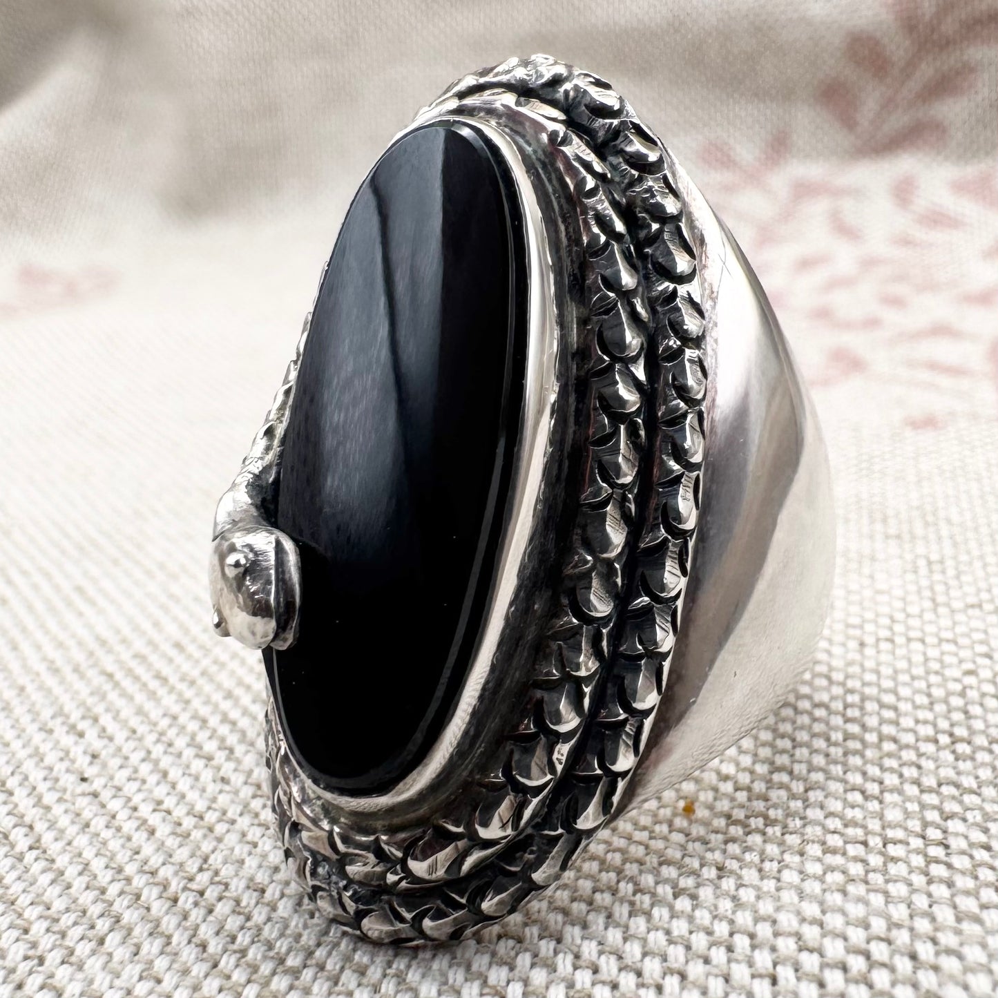 Black onyx snake ring in sterling silver by 'Gypsy Silver', size O (US 7), hallmarked London 2022