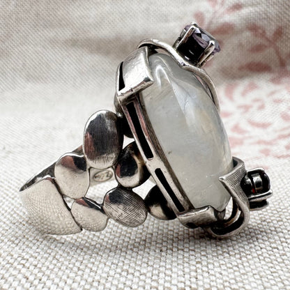 Silver moonstone ring with lilac and red stone accents, size R.5 (US 9)