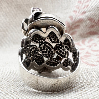 Silver moonstone ring with lilac and red stone accents, size R.5 (US 9)