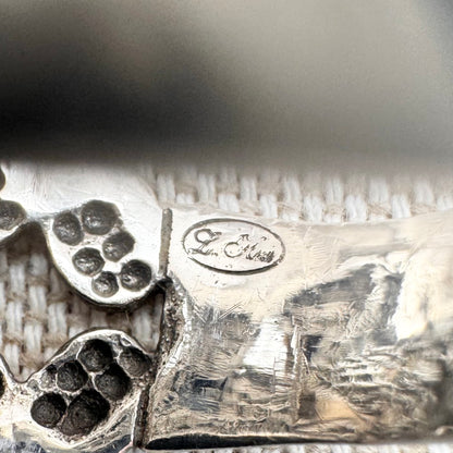 Silver moonstone ring with lilac and red stone accents, size R.5 (US 9)