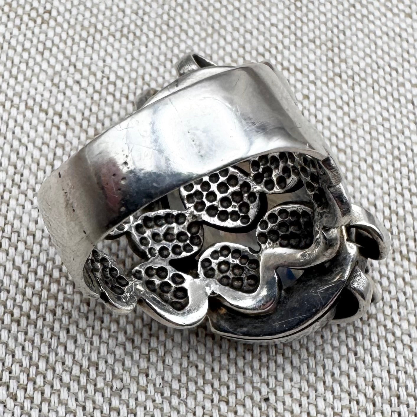 Silver moonstone ring with lilac and red stone accents, size R.5 (US 9)