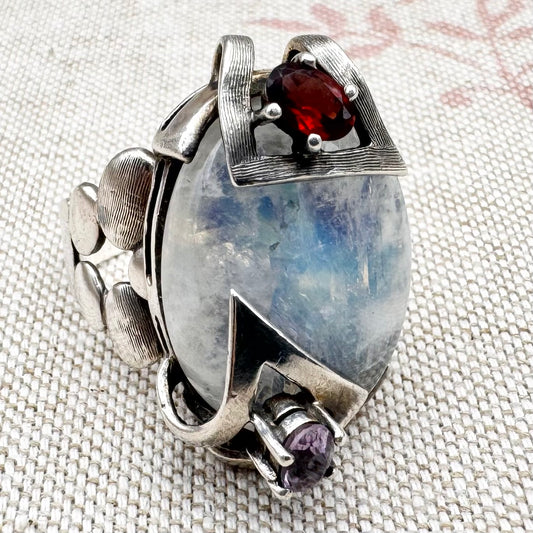 Silver moonstone ring with lilac and red stone accents, size R.5 (US 9)