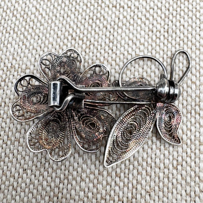 Vintage silver filigree floral brooch