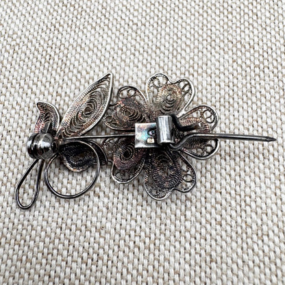 Vintage silver filigree floral brooch