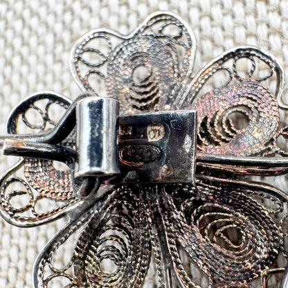 Vintage silver filigree floral brooch