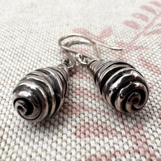 Silver spiral drop earrings with sculptural organic form