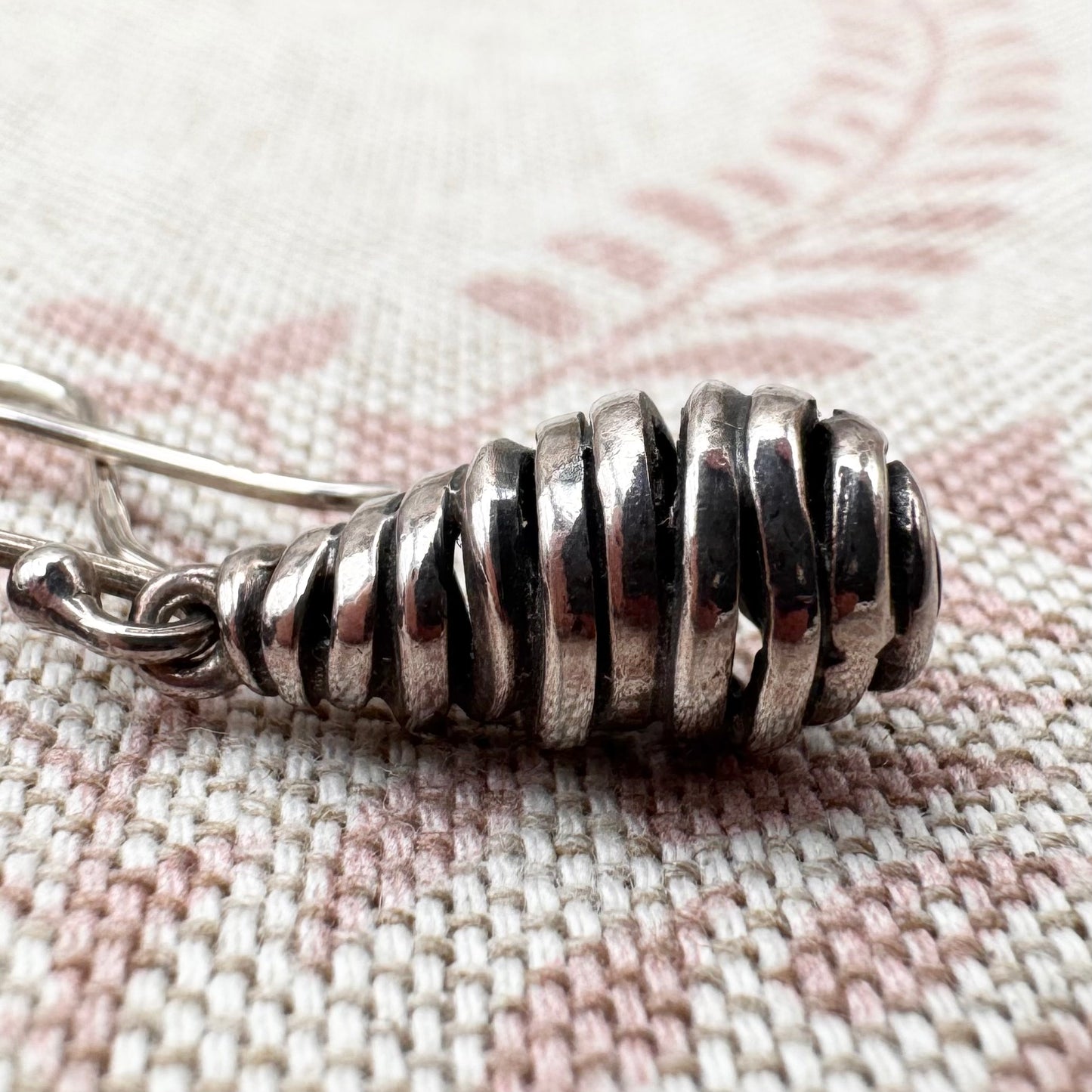 Silver spiral drop earrings with sculptural organic form
