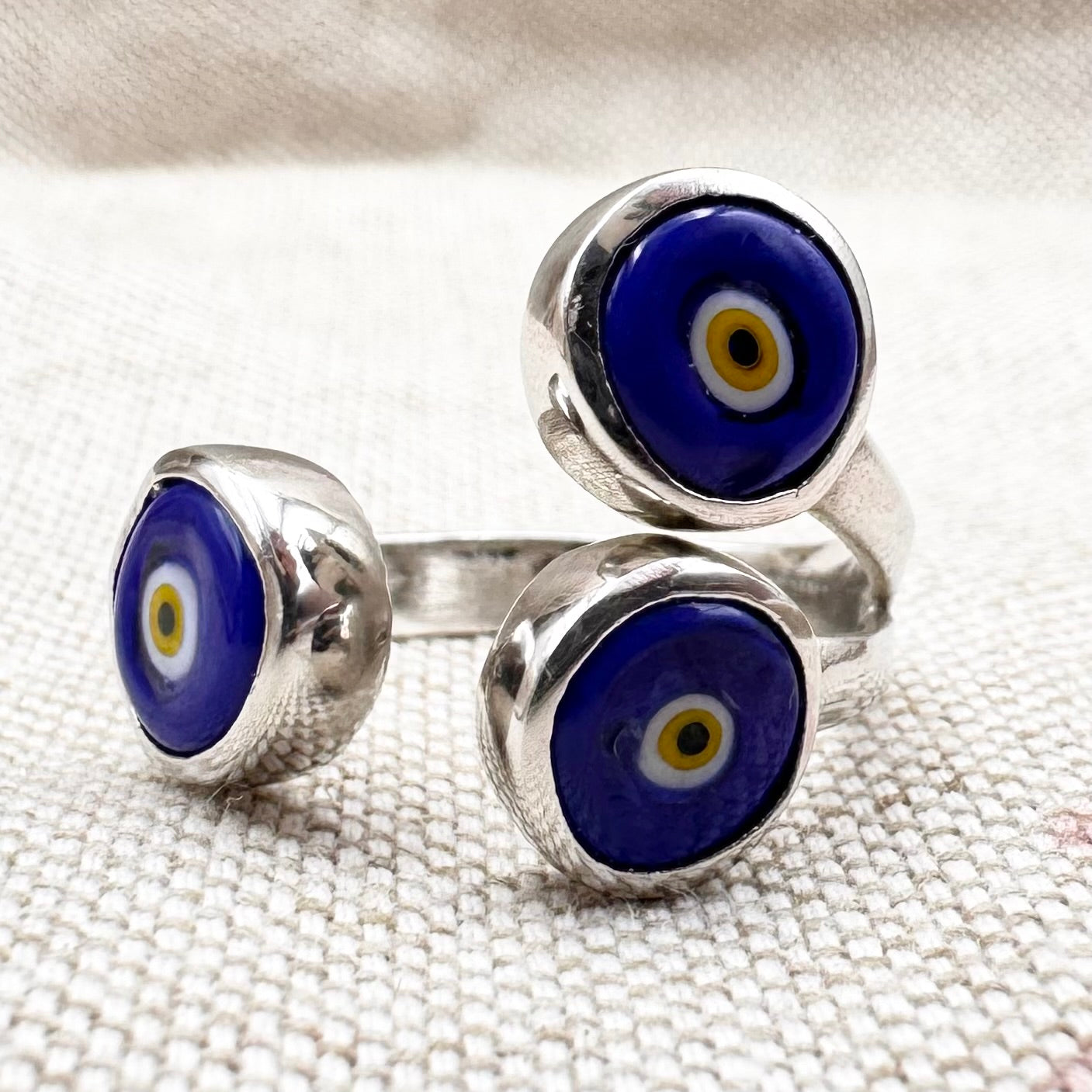 Silver triple 'evil eye' ring, size M (US 6) - adjustable