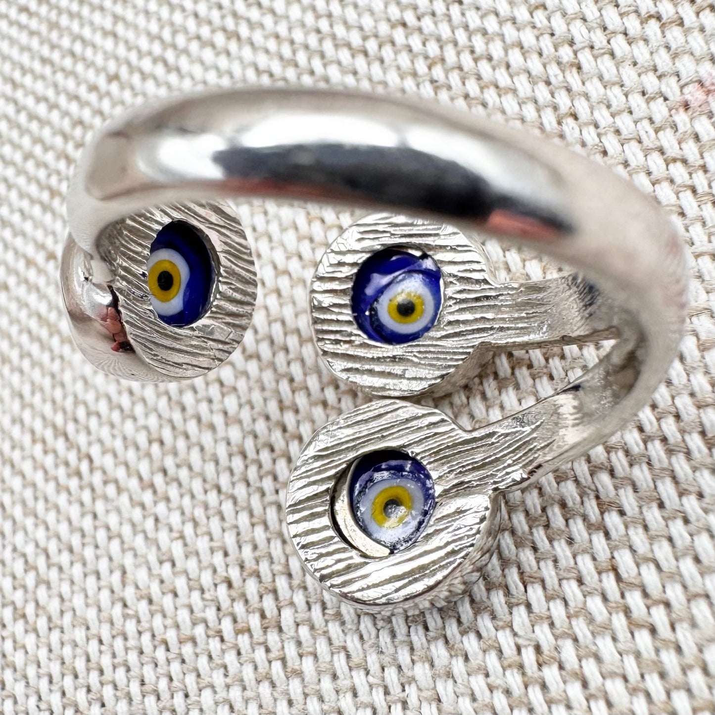 Silver triple 'evil eye' ring, size M (US 6) - adjustable