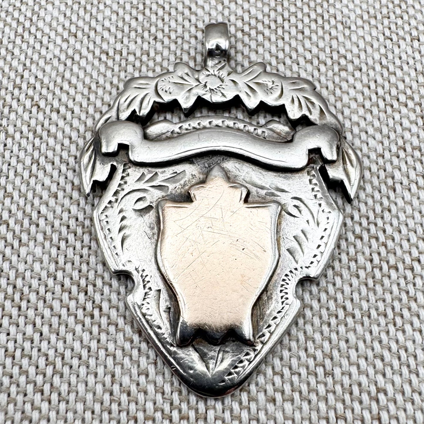 Antique unengraved silver medal fob, hallmarked Chester 1905