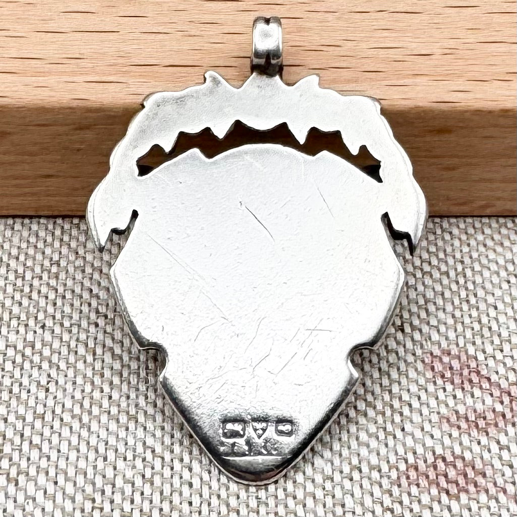 Antique unengraved silver medal fob, hallmarked Chester 1905